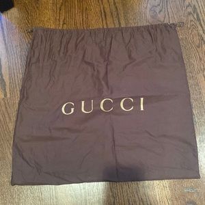 Brown Gucci dust bag